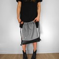 light grey backapck black bottom drawstring bag