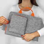 LAPTOP SLEEVE WITH ORANGE HANDS
