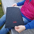 vertical dark grey felt case personalized with name MacBook sleeve laptop cover